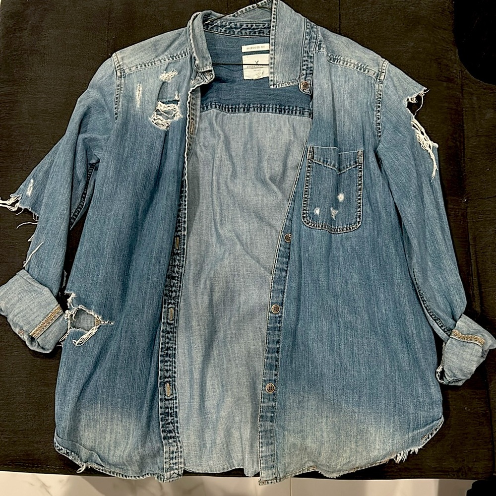 Ripped denim button up shirt
